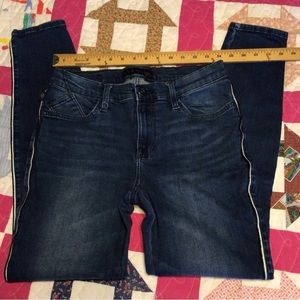 Rock and Republic blue jeans with pinstripe detail.